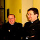 Cardinal Giovanni Canestri converses with a group of priests participating in the retreat. 