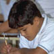 Ni&ntilde;o escribiendo.