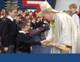 Bishop Farrell greets a few young students of The Highlands School during the offertory of the Mass.