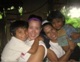 Missionaries Mariah Wondersee and Paty Abreu with children from the village.