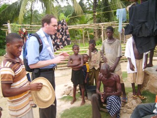 Fr Jeffery Jambon, LC, with kids in Ghana