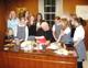 Challenge girls gather around Bishop Malone in his office at the chancery.