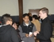 Br Luke Rawicki, LC, talks with a family during the Door to Door mission.
