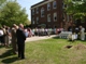 The consecrated women and their guests gather for the groundbreaking ceremony on the site of the new library.