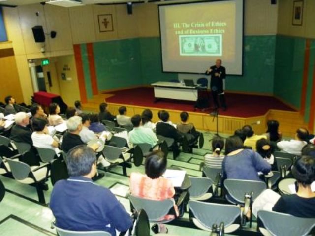 Fr Michael Ryan giving talk in China