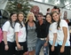 Pure Fashion models pose with Stacey and Bert Weiss.