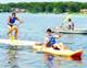 OUTDOORS�Young men take to the lake in canoes and kayaks at Camp Veritas. Photo: Maria R. Bastone