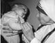Mother Teresa with one of Donna-Marie's children.
