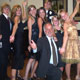 Academy Award winning producer Steve McEveety �hams it up� with members of Young Artists for the Third Millennium during an event in St. Louis.
