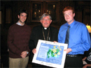 Archbishop Collins receives spiritual bouquet from Compass.