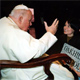 Denise asks for John Paul II�s blessing on the Oakhill School, founded in the year 2000.