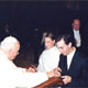 Sally and Paul d�Assumpcao receiving the Pope�s blessing while on their honeymoon in Rome.